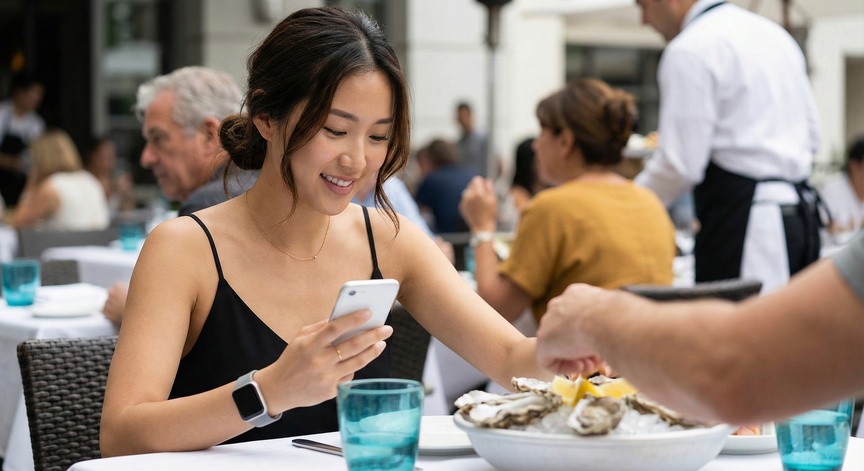 Woman enjoying meal at restaurant